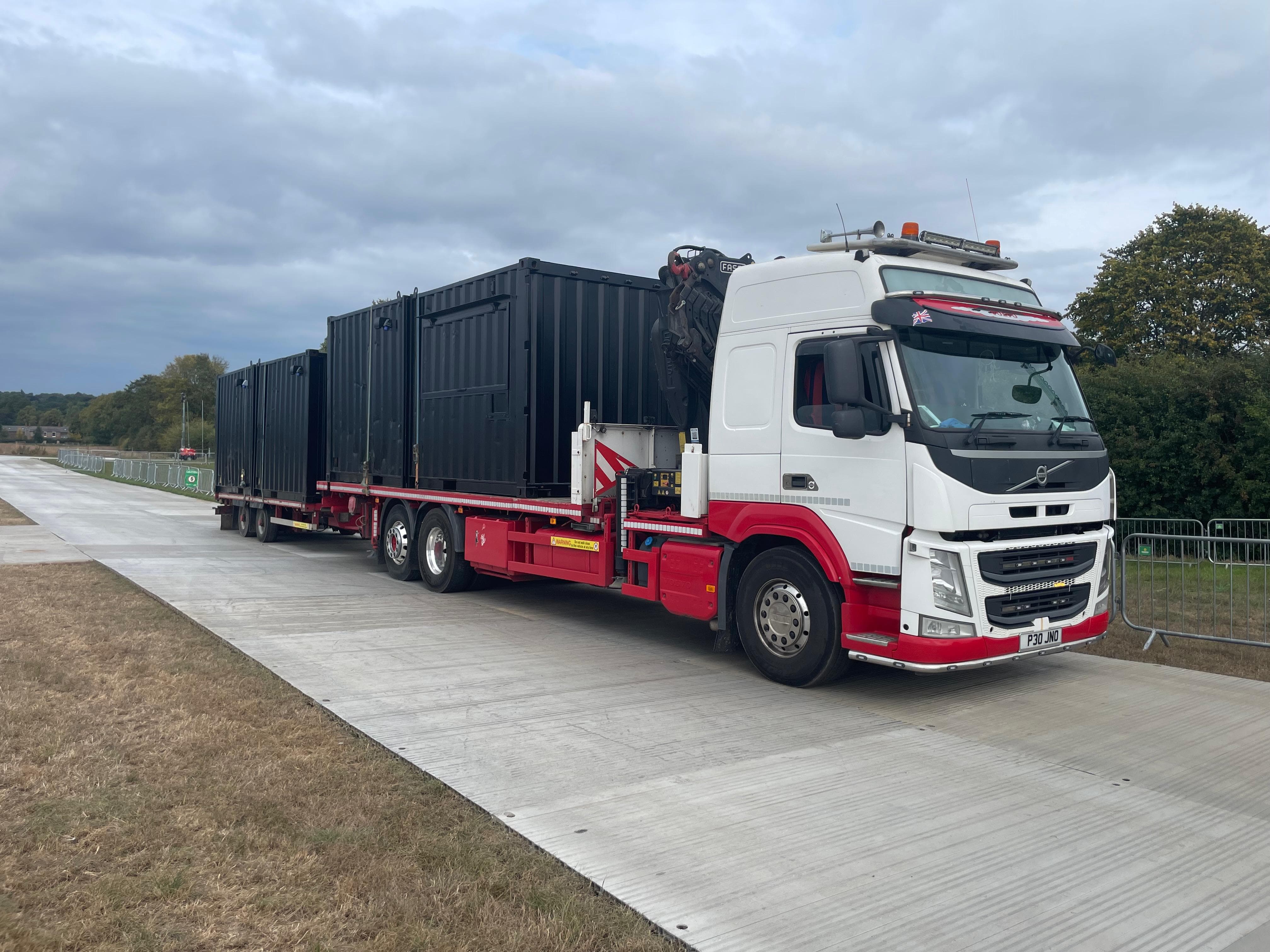 HIAB crane lorry unloading steel beams in Merseyside